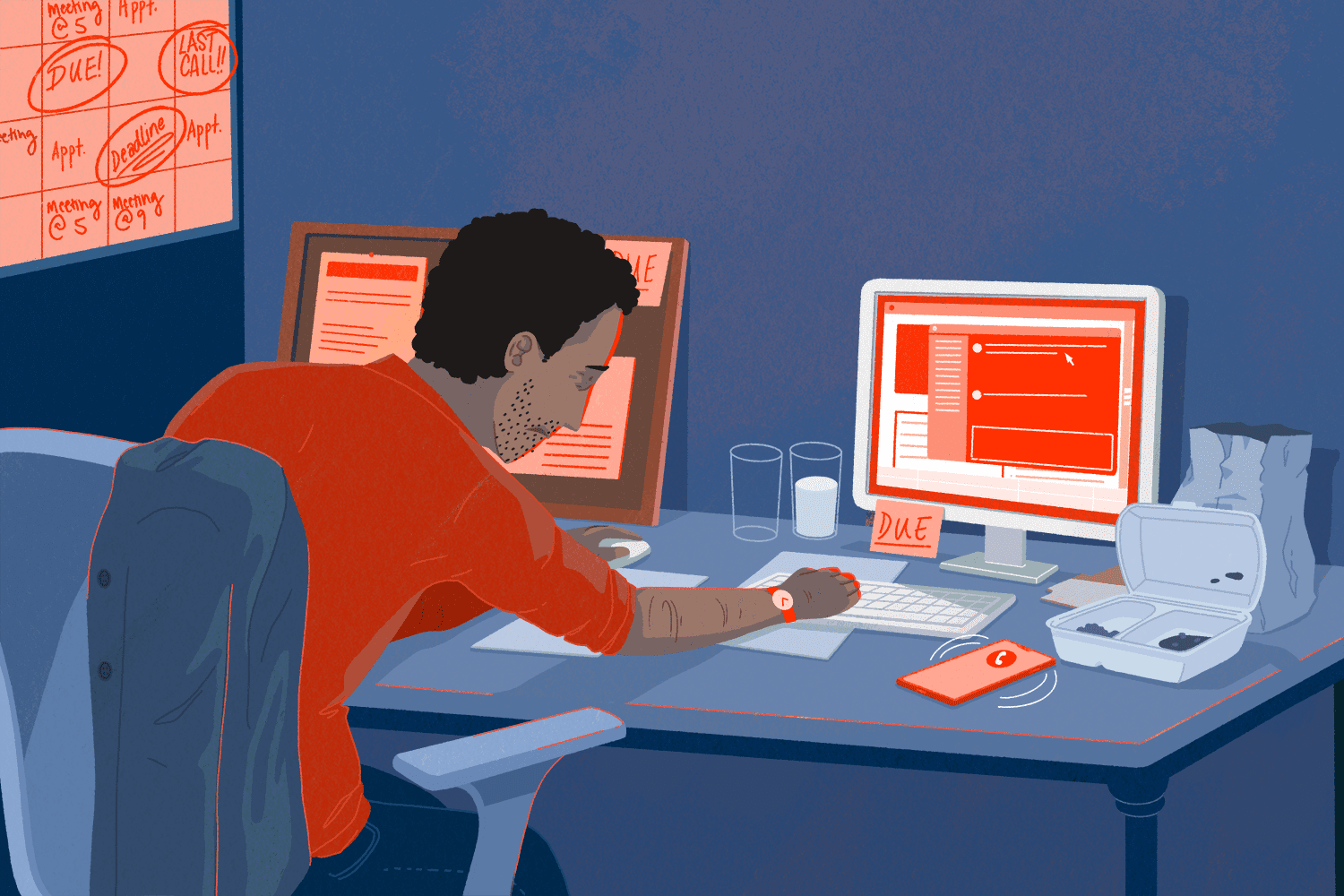 man sitting in front of computer at night man sitting in front of computer at night