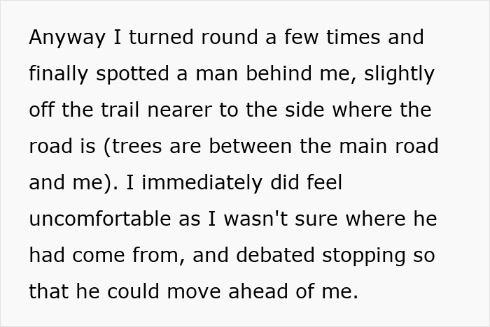 Person walking in the woods with a strange man visible behind, creating an uneasy feeling of being followed in nature. Person walking in the woods with a strange man visible behind, creating an uneasy feeling of being followed in nature.