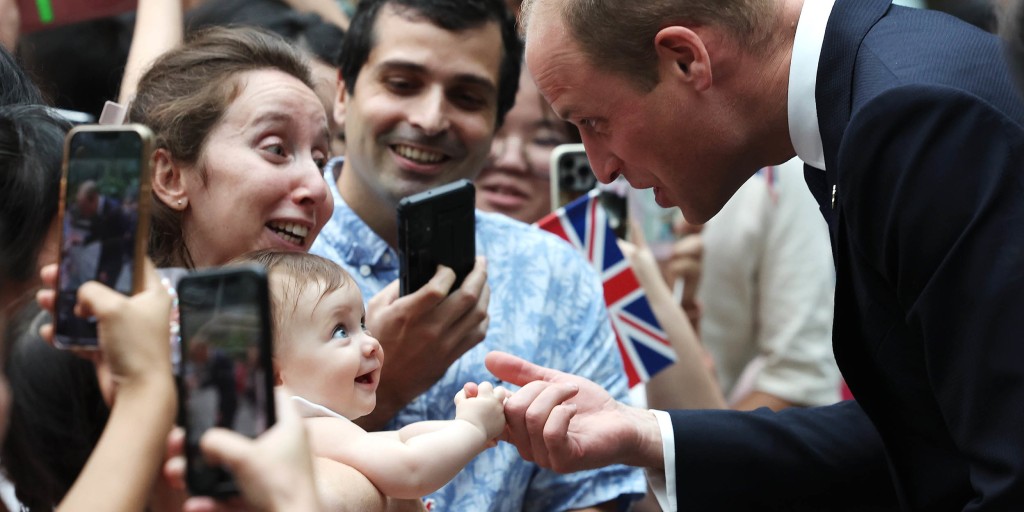 Prince William has the cutest response to a baby biting down on his finger