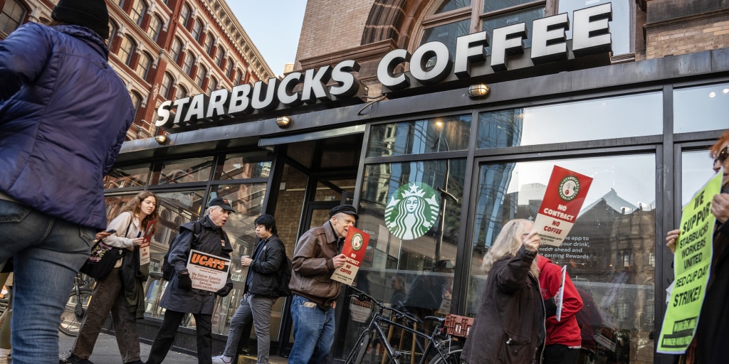 Starbucks workers hold largest strike in company history on Red Cup Day