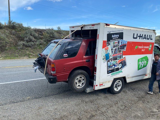 Washington state troopers pull over driver who crammed SUV into back of  U-Haul